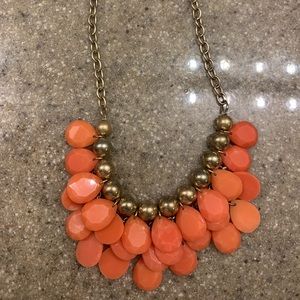 Francesca’s coral pebble necklace with gold